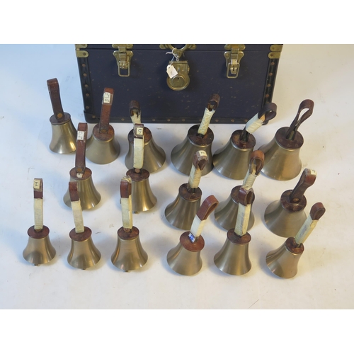 1089A - A set of seventeen bell ringers hand bells, contained in a case.