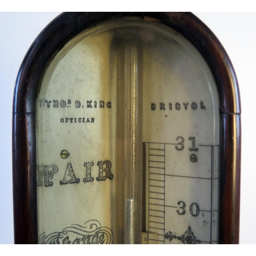 1267A - A 19th century mahogany stick barometer by Thomas King, Bristol, with ivory scale and fitted with me... 