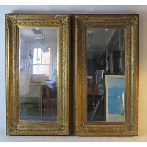 1589 - A pair of 18th century style gilt framed wall mirrors, with rectangular mirror plates, overall size ... 