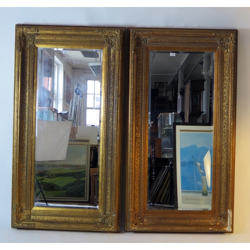 1590 - A pair of 18th century style gilt framed wall mirrors, with rectangular mirror plates, overall sixe.... 