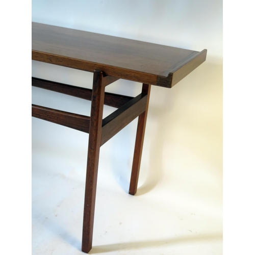 1636A - A Danish rosewood side table by Finn Juhl for Vodder, the rectangular top with swept ends, raised on... 