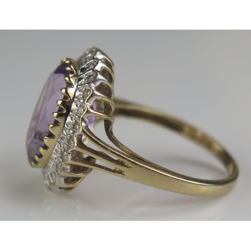 296 - A 9ct Gold, Amethyst and Diamond Ring, 19x16.8mm head, size R, CCM mark, 4.93g