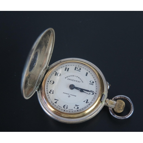 100 - An INVENTIC Shock Proof Half Hunter Pocket Watch in a white metal case