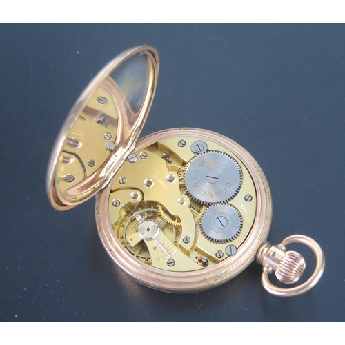 107 - A 9ct Gold Open Dial Keyless Pocket Watch, 49mm case, Birmingham 1929. Running, glass damaged. 88.13... 