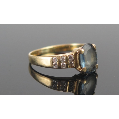 115 - An 18ct Gold, Topaz and Diamond Ring, size I.5, indistinctly stamped 18, 2.49g