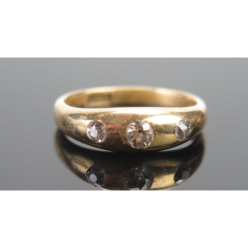 124 - An Antique 18ct Gold and Old Cut Diamond Three Stone Ring, c. 3.7mm principal stone, size O.5, stamp... 