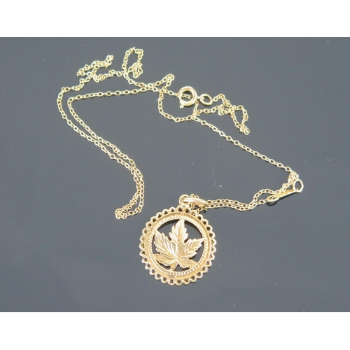 132 - A 10KT Gold Maple Leaf Pendant on chain, 3.86g