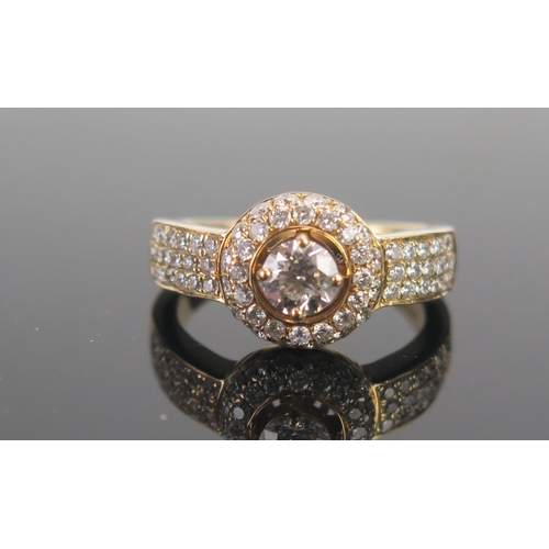 133 - An 18ct Gold and Diamond Ring, 4.84mm principal round cut stone, stamped 750, size M, 6.54g