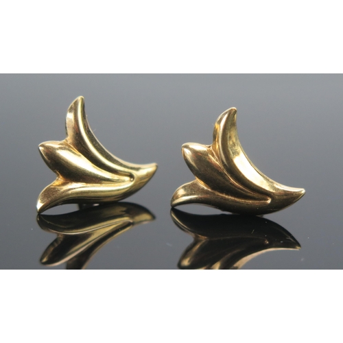 139 - A pair of 18ct Gold Foliate Studs, stamped 750, 1.96g