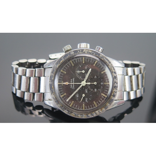 A Rare Omega Speedmaster 'Ed White' Pre-Moon Chronograph Stainless Steel Gent's Chronograph Wristwatch, reference no. ST 105 003-65, movement serial no. 2401134**, circa 1966, tachymeter bezel, matt black 'T SWISS MADE T' dial with chronograph centre seconds, baton markers, minute markers, triple subsidiary dials, cal. 321 17 jewel movement with inner cap, Omega bracelet, boxed, 40mm. Winds and runs. Age related faults, buttons need attention

** In 1965 Edward Higgins 'Ed' White (1930-1967) was the first American to 'walk in space' outside of his Gemini 4 capsule. The Omega 105.003 has been coined the 'Ed White' as it was on the wrist of White during this historic milestone in space exploration

** The production period of the 105.003 was very short, lasting around three years from 1963. In 1966 it was superseded by the 'Professional' ref.105.012 famously worn on the moon in 1969