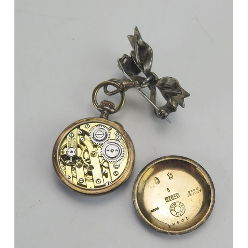 177 - A Fauvette Had Ladies .935 Silver Floral Enamel Fob Watch on a bow brooch suspension, 28mm case, bac... 