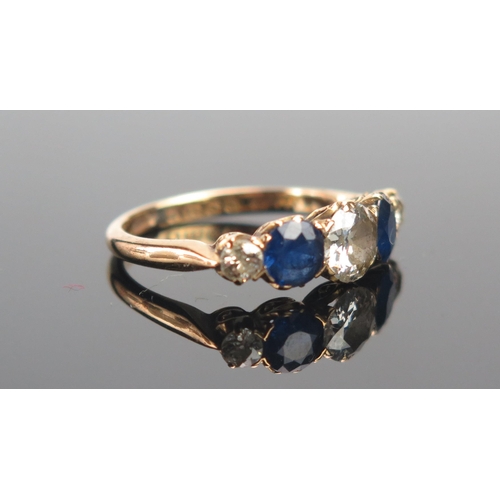 18 - An Antique 18ct Gold, Sapphire and Diamond Five Stone Ring, 5.45mm principal old cut with 2.15mm sto... 