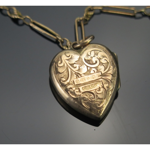 19 - An Antique 9ct Gold Heart Shaped Locket with chased foliate decoration (24.2mm drop, Birmingham 1908... 