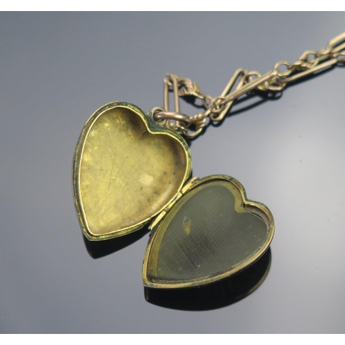 19 - An Antique 9ct Gold Heart Shaped Locket with chased foliate decoration (24.2mm drop, Birmingham 1908... 