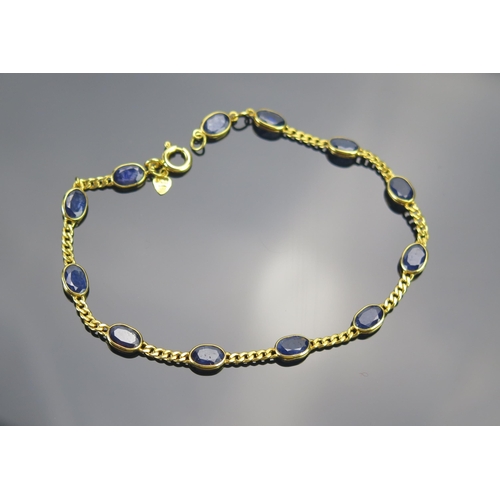 30 - An 18ct Gold and Sapphire Bracelet, 7