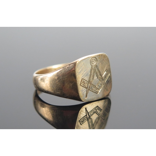 34 - A 9ct Gold Masonic Ring engraved with a square and compass, size M.5, rubbed Chester hallmarks, 3.32... 