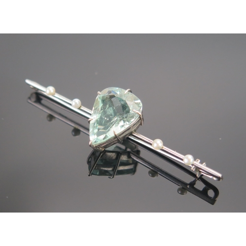4 - A 9ct White Gold, Aqua Marine and Seed Pearl Bar Brooch, 60mm, stamped 9CT, 16.5x12mm stone, 4.46g