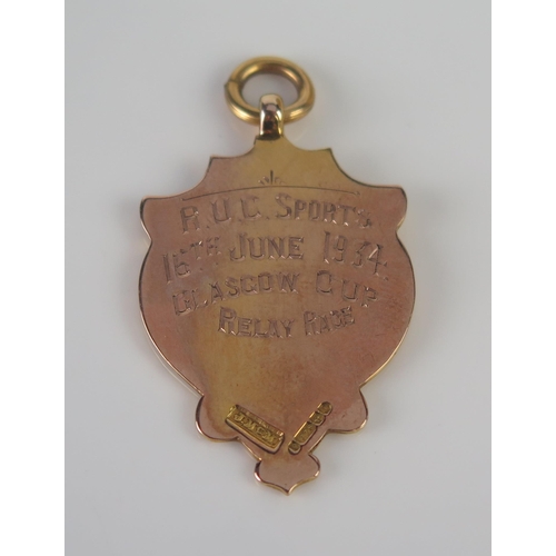 417 - A 9ct Gold and Enamel R.U.C. Sports Glasgow Cup Relay Race 1934 Fob Medallion, 5.62g