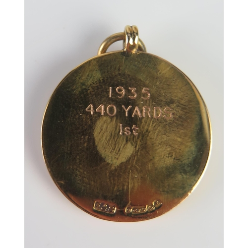 421 - A 9ct Gold and Enamel Yorkshire N.C.A.A. Championship 1935 440yds Winners Fob Medallion, 17g