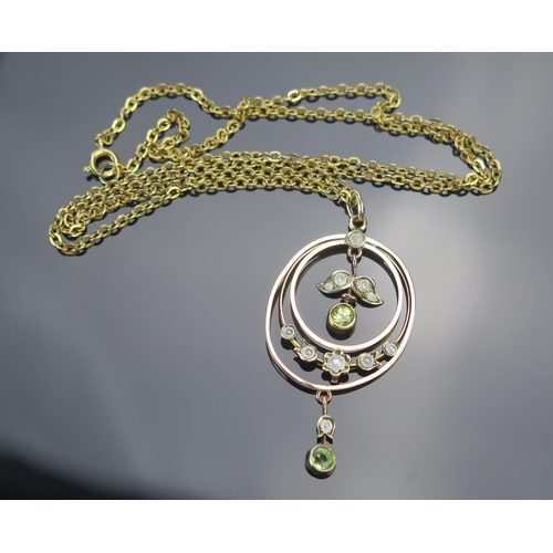 45 - A 9ct Gold, Peridot and Seed Pearl Pendant, 46mm drop, stamped 9CT, 2.21g and one a gold plated chai... 