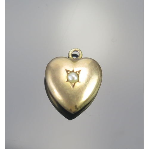 46 - A Victorian 9ct Gold and Seed Pearl Heart Shaped Pendant, 14mm drop, Birmingham 1898, .66g