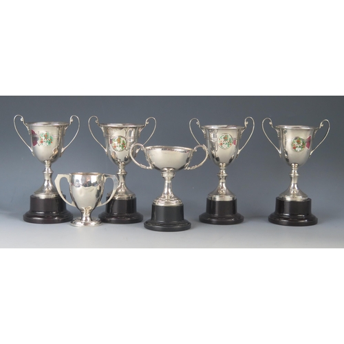 513 - Six assorted silver twin-handled trophy cups, various makers and dates, 7cm, 8cm and 12cm high, tota... 