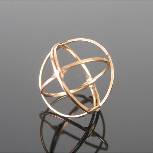 6 - An Unusual Precious Yellow Metal Hinged Ring opening to a sphere, KEE tests as 9ct, size S, 1.87g.  ... 