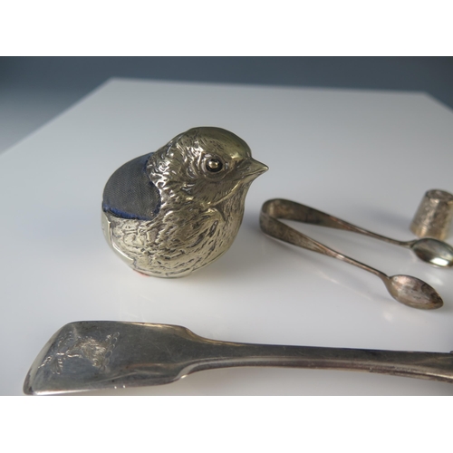 606 - A novelty silver plated pin cushion in the form of an chick emerging from an egg 7cm high, a silver ... 