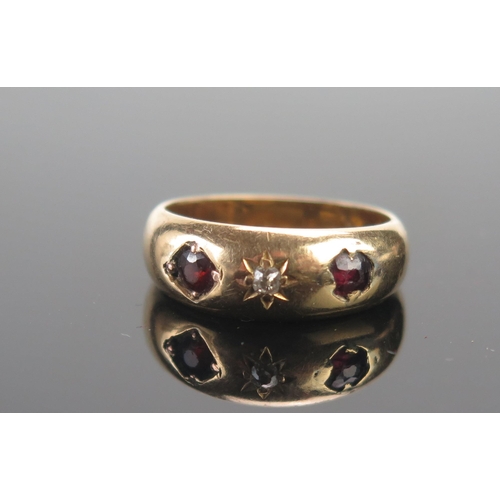 61 - An Antique R18ct Gold, Ruby and Diamond Three Stone Gypsy Ring, size N, Chester 1902, 3.32g