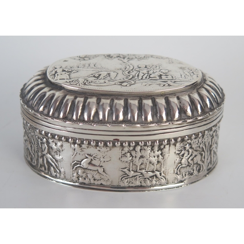 639 - A Dutch silver trinket box, stamped marks, of oval outline, the hinged lid decorated with figures an... 