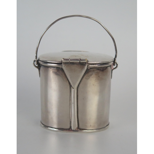 642 - A white metal novelty box in the form of as milk pail, with loop handled, 6cm high,