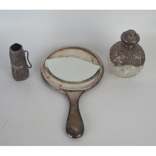 653 - A mixed collection of silver wares, various makers and dates includes, hand mirror, (A/F), clear gla... 