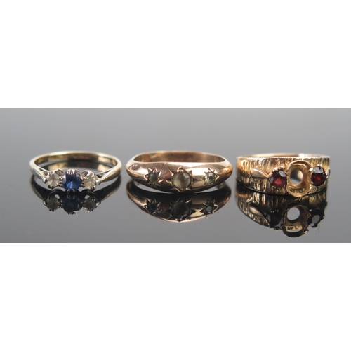 66 - Three 9ct Gold Rings including a sapphire and CZ three stone (size L), antique three stone gypsy rin... 