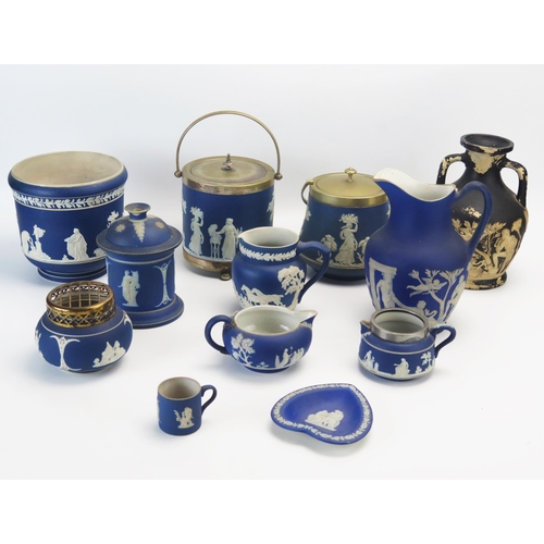 1011 - A collection of Wedgwood  and other jasper wares including biscuit barrels, jugs,  jardinière,  and ... 