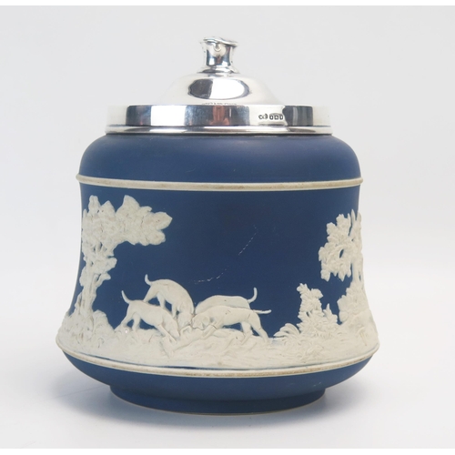 1014 - An Adams jasperware style and silver mounted biscuit jar and cover, marks for William Comyns & Sons ... 