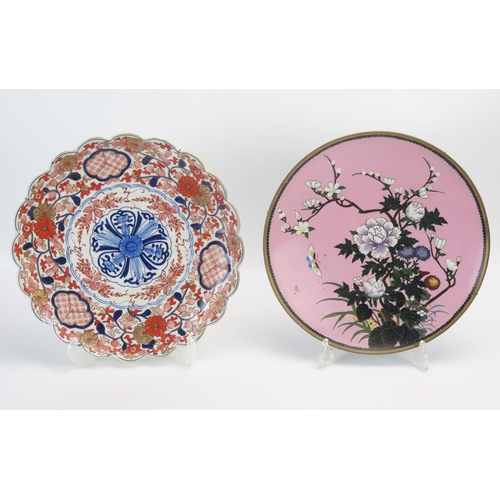 1020 - An Imari porcelain charger of traditional design with wavy edge border, 31cm diameter together with ... 