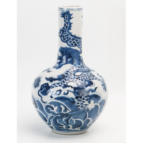 1024 - A Chinese blue and white bottle vase, decorated with dragon, and fish,  bears Qianlong style charact... 