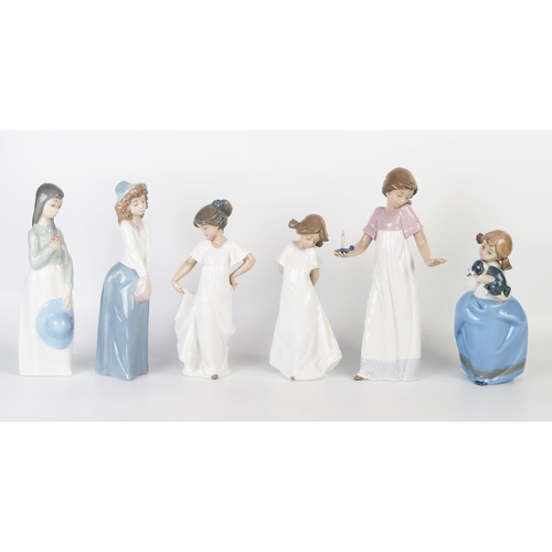 1035 - A collection of six Nao porcelain figurines of young girls, various sizes. (6).