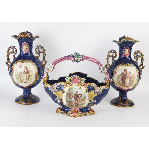 1041 - A continental pottery three-piece garniture set, includes basket and two vases with transfer print d... 