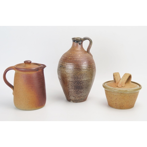 1050 - A Muchelney pottery jug and cover, impressed mark, 16cm high, a Muchelney ovoid flask 23cm high, and... 