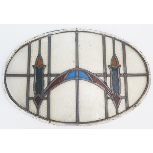 1055 - An early 20th century leaded glass oval door panel, 39cm x 59cm,