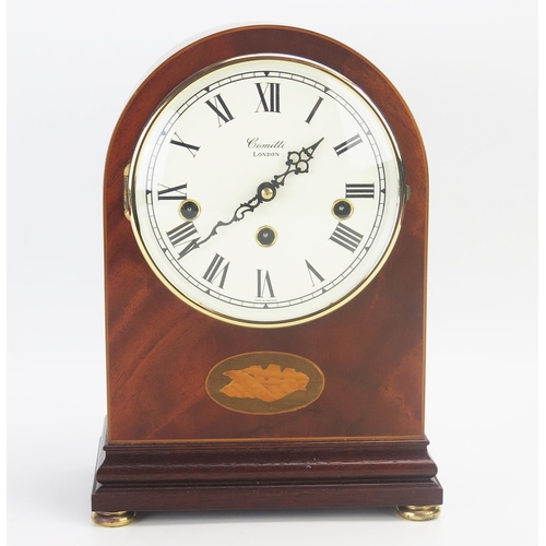 1068 - A mahogany and boxwood strung and inlaid mantel clock, of arched outline, with 14.5cm silvered Roman... 