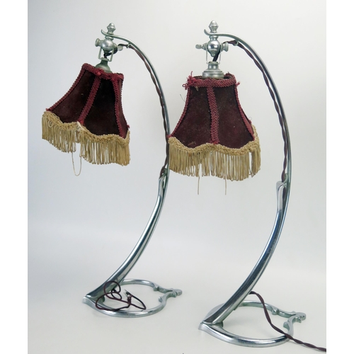 1071 - W.A.S. Benson, a rare pair of model 1079 chrome table lamps, c. 1900, the adjustable heads on swept ... 