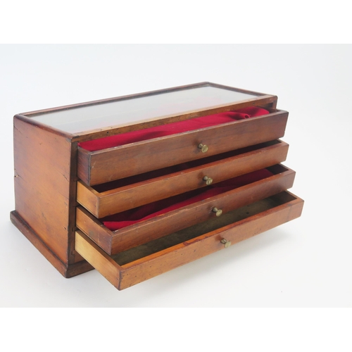 1074 - An Edwardian lingerie counter top display case with glazed top and four long drawers for 