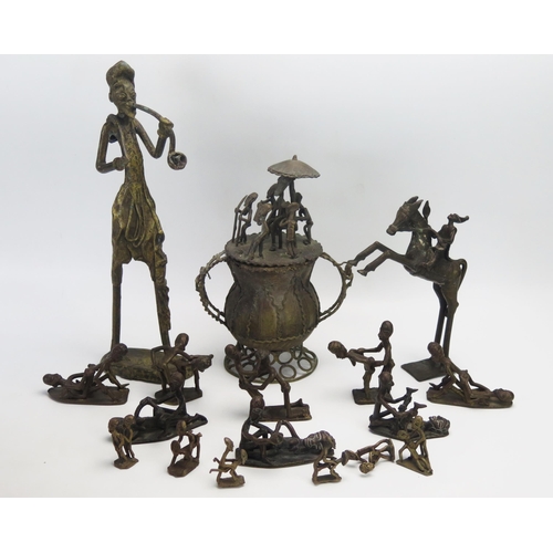 1081 - A collection of African bronze erotic and other figures.