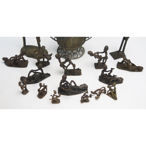 1081 - A collection of African bronze erotic and other figures.