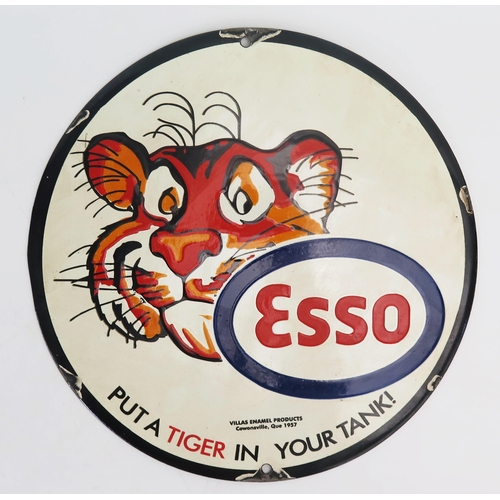 1082 - A reproduction enamel circular advertising sign, Esso 'Put A Tiger In Your Tank' 30.5cm diameter.