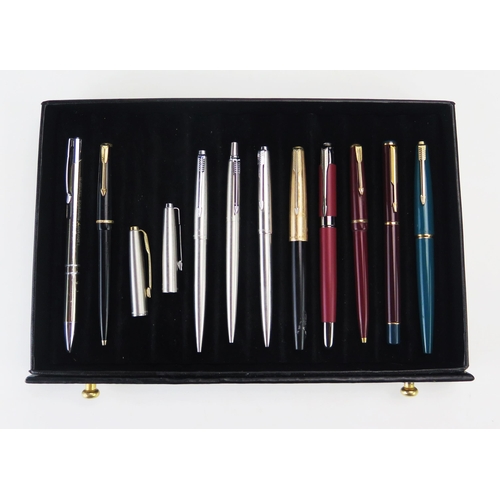 1096 - A collection of Parker, Papermate and other fountain pens, ball point pens, contained in a collector... 