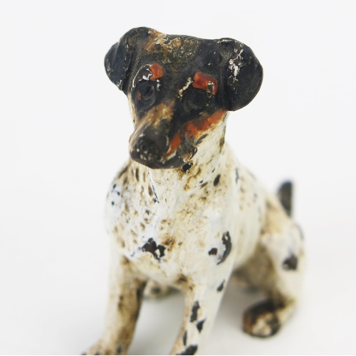 1100 - An Austrian cold painted bronze model of a terrier dog, 5cm high.