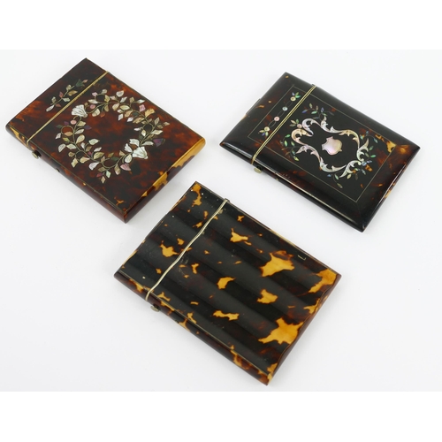 1101 - Two tortoiseshell and mother-of-pearl inlaid card cases both 10.5cm long, together with a blonde tor... 